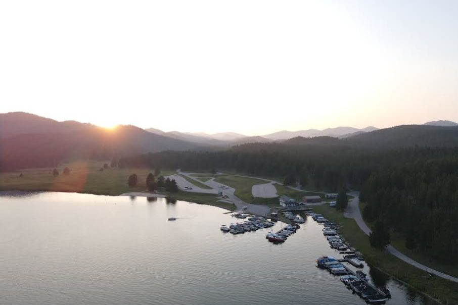 Birds eye view of Sheridan Lake Marina with the Black Hills in the background